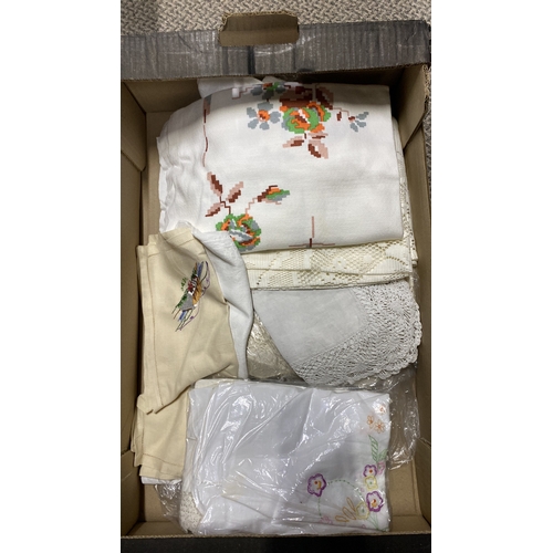 455 - Mixed lot of textiles includes embroidered and crocheted tablecloths, doilies, napkins, and handkerc... 