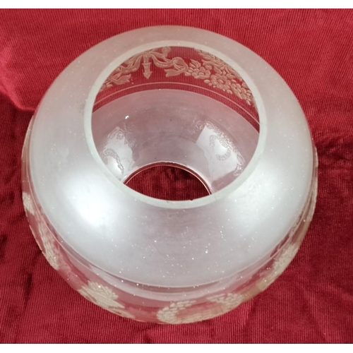 104 - Frosted glass oil lamp globe with an etched laurel wreath and torch design.