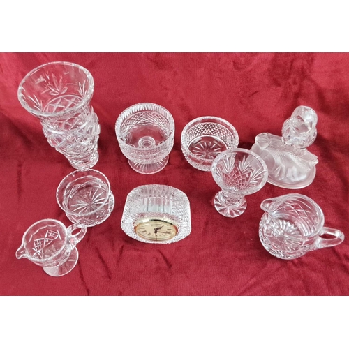 108 - Collection of ten cut glass decorative pieces including vases, bowls, pitchers, and a clock, detaile... 