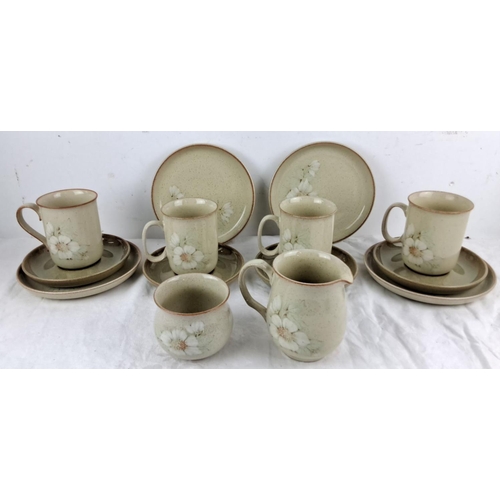 110 - Denby Daybreak stoneware set featuring eight pieces. Collection includes four cups, four saucers, an... 