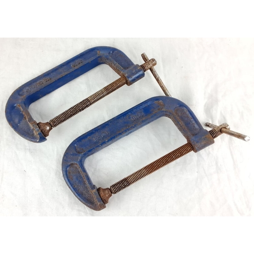 115 - Pair of blue cast iron G-clamps, models 3115 and 39115, with adjustable threaded screws.