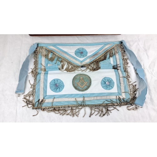 117 - Masonic apron with light blue and white fabric, detailed with embroidered Masonic symbol, silver fri... 