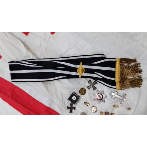 123 - Ceremonial attire includes embroidered tunics, sashes, red cap, belts, and insignia patches, featuri... 