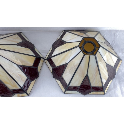 1 - Pair of stained glass lamp shades in a geometric Art Deco design feature cream and burgundy glass pa... 