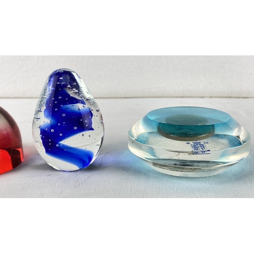 14 - Collection of decorative glass paperweights.