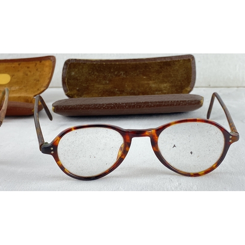 17 - Vintage tortoisell eyeglasses with an accompanying brown leather case, marked 