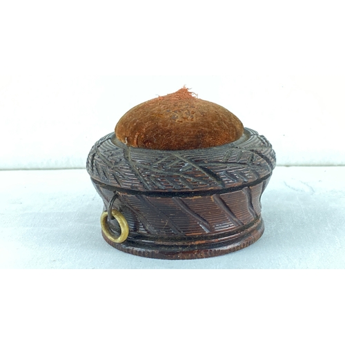 21 - Antique Victorian hand-carved wooden pin cushion with intricate detailing.