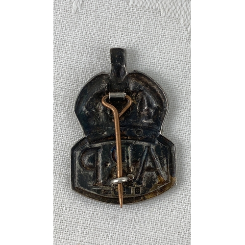 28 - Sterling silver ARP badge, featuring detailed crown design. Rear hallmark from Birmingham, 1942. Cra... 