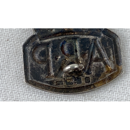 28 - Sterling silver ARP badge, featuring detailed crown design. Rear hallmark from Birmingham, 1942. Cra... 