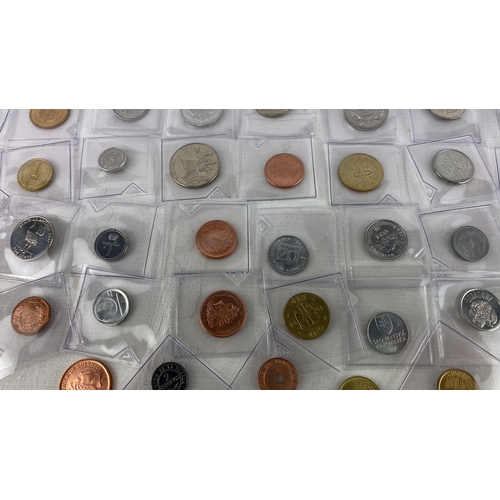 33 - Assorted world coins collection, featuring pieces from countries such as Lithuania, Turkey, Japan, P... 