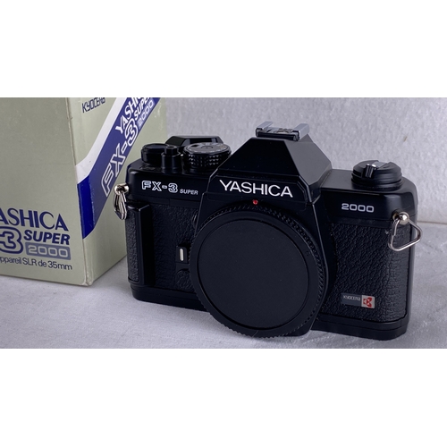 41 - Yashica FX-3 Super 2000 35mm SLR camera by Kyocera, complete with original box.