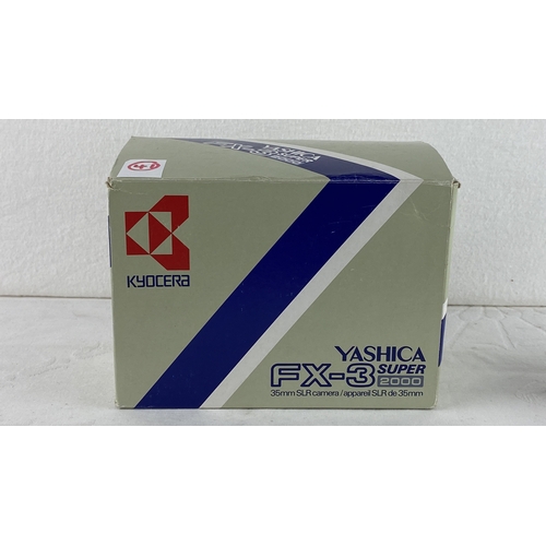 41 - Yashica FX-3 Super 2000 35mm SLR camera by Kyocera, complete with original box.