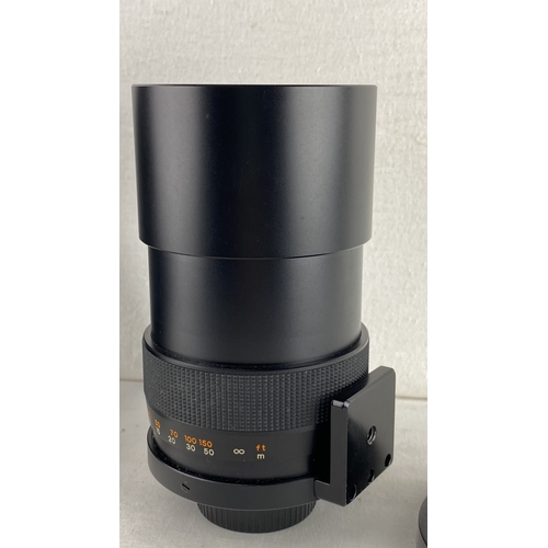 45 - Yashica Reflex 500mm f/8 telephoto lens, Japan. Model 5202330, includes front and rear caps.