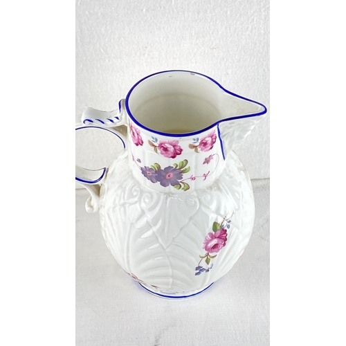 7 - Coalport Porcelain water pitcher with embossed leaf motifs and vibrant floral patterns, highlighted ... 