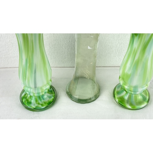 9 - Set of three green hand-blown glass vases with unique ruffled and fluted rims feature marbled patter... 