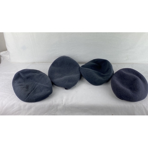 52 - Collection vintage RAF military berets in navy blue wool, lined interiors with identification tags.