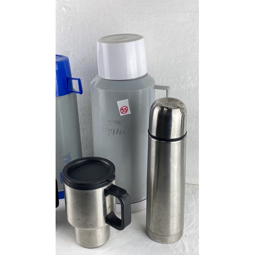 55 - Set of five Thermos containers, including three large plastic models (two with blue caps and one wit... 