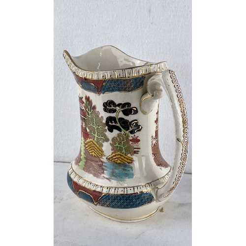 68 - Victorian ceramic jug with Oriental-style hand-painted decorations, featuring multicolored scenic im... 