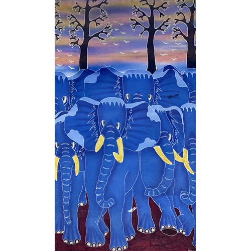 75 - Pair of batik paintings featuring vibrant wildlife scenes. One depicts a group of blue elephants aga... 