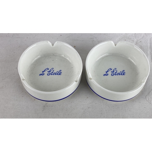 82 - Pair of Wedgwood bone china ashtrays, marked 'L'Étoile'. Made in England, from 1984.