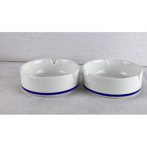 82 - Pair of Wedgwood bone china ashtrays, marked 'L'Étoile'. Made in England, from 1984.