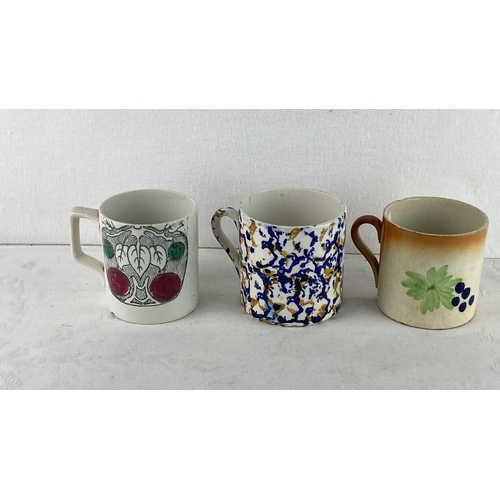 89 - Set of three vintage ceramic mugs, featuring various floral and fruit motifs, with hand-painted desi... 