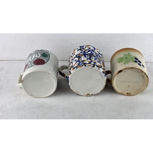 89 - Set of three vintage ceramic mugs, featuring various floral and fruit motifs, with hand-painted desi... 