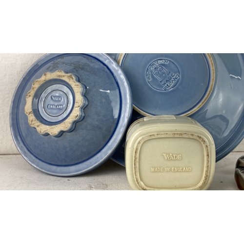 90 - Four assorted pieces of Wade Irish porcelain s including a decorative plate, blue dish, floral trink... 