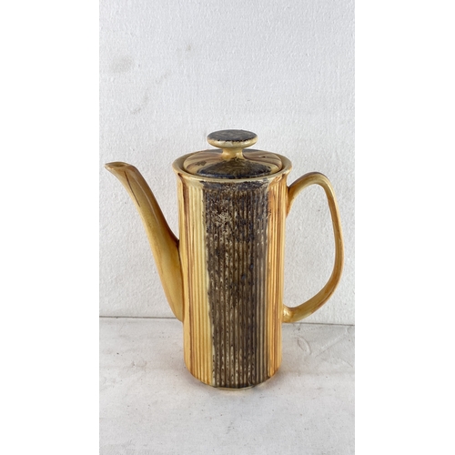 91 - Mid-Century Price Kensington ceramic coffee pot with ribbed texture and earthy glaze. It has a curve... 