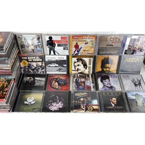 92 - Lot of music CDs featuring classic rock and popular artists including Oasis, Bruce Springsteen, Thin... 