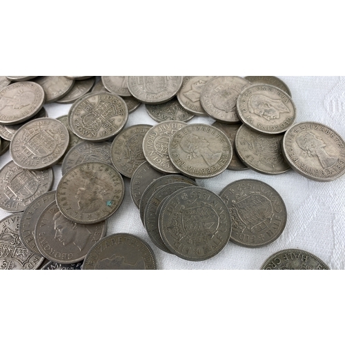 35 - Collection of British half crown coins featuring heads of George VI and Elizabeth II, spanning years... 