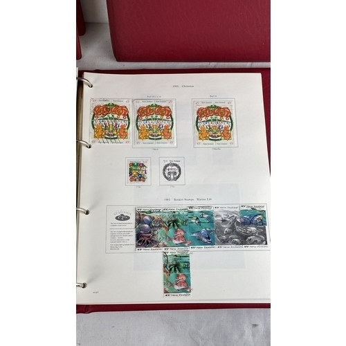 96 - Three collectors Stanley Gibbons Stamp albums containing a collection of New Zealand, Channel Island... 