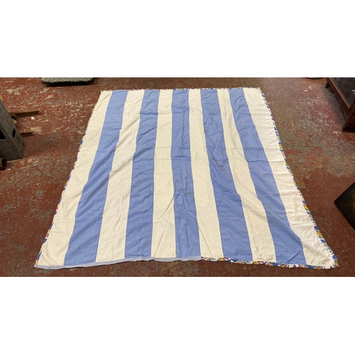 287 - Blue and white striped quilt with a patterned border, featuring alternating solid color strips. Inte... 