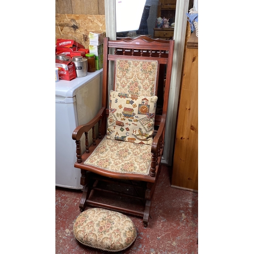 298 - Wooden rocking chair with floral upholstery and matching footstool, featuring turned spindle arms an... 