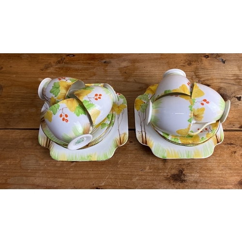 275 - Royal Grafton, bone china tea set, features a floral pattern with yellow, green, and orange accents,... 