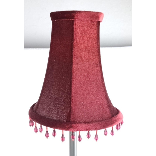 103 - Vintage table lamp with ornate metal base and burgundy velvet lampshade, featuring decorative fringe... 