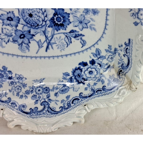 109 - Blue and white ceramic serving platter featuring intricate floral patterns and butterfly motif, with... 