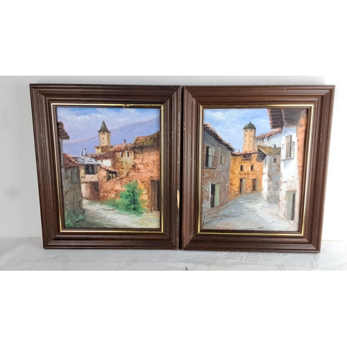 110 - Pair of oil paintings depict village street scenes, artist signed 