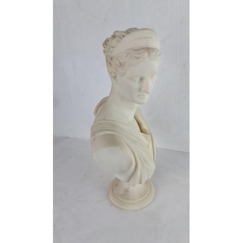 116 - Plaster bust of a classical Greek woman, featuring draped attire and detailed headwear, measuring 12... 