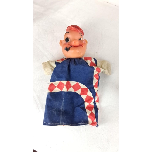 123 - Vintage clown doll with cloth overalls and cap, featuring a painted porcelain face. Includes an addi... 