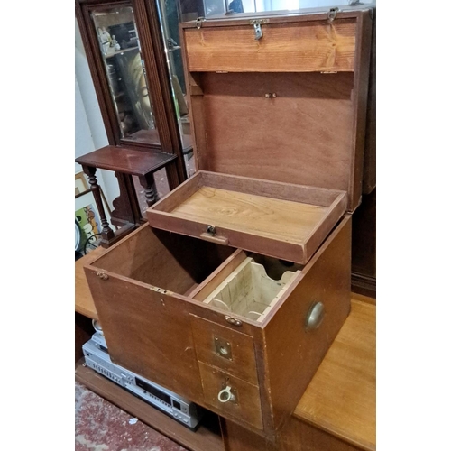 129 - Early 20th Century wooden chest, mahogany, with interior compartments and brass handles. Features tw... 