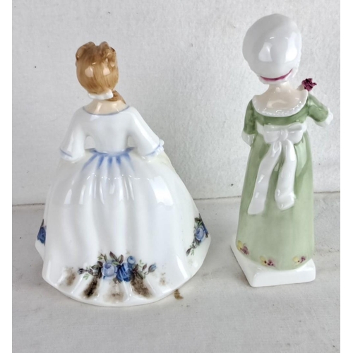 173 - Pair of Royal Doulton figurines.