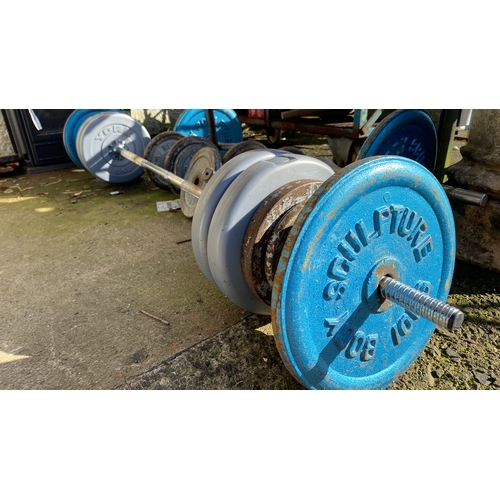 393 - Mixed lot of weightlifting equipment, includes various weights, barbells, and dumbbells. Brands incl... 