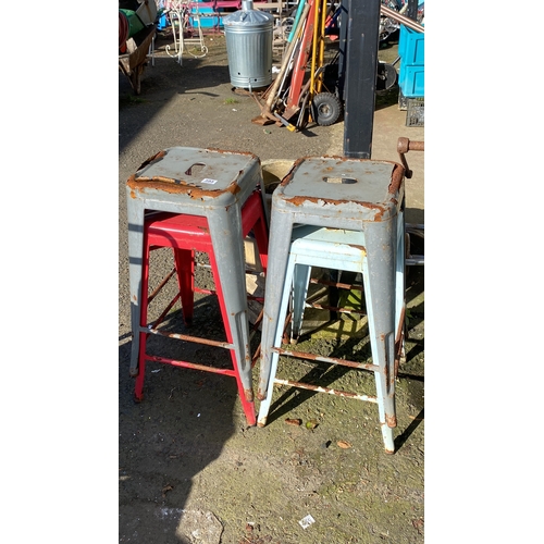 395 - Set of four vintage metal bar stools with distressed paint.