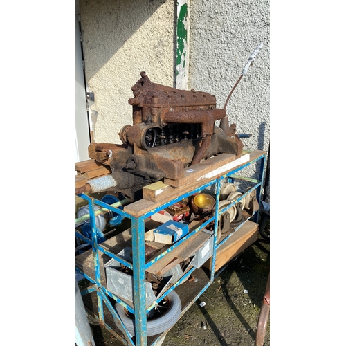 396 - Vintage Morris Cowley engine block and components, displayed on a metal trolley unit with various me... 