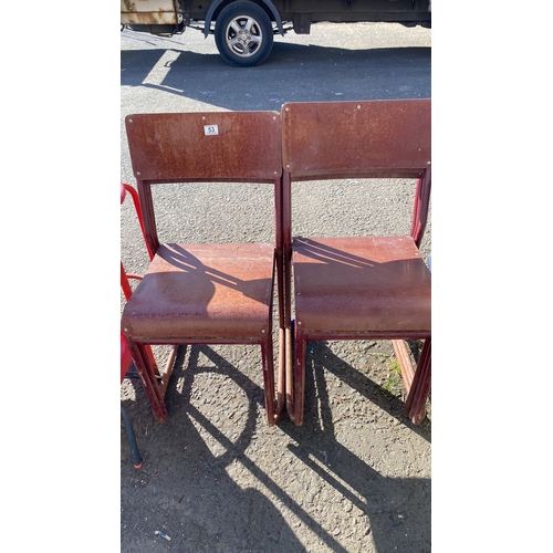 404 - Set of vintage wooden chairs, three red plastic chairs, and a matching red plastic stool.