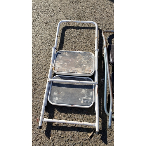 405 - Pair of vintage metal folding step stools with rubber treads. Sturdy construction.