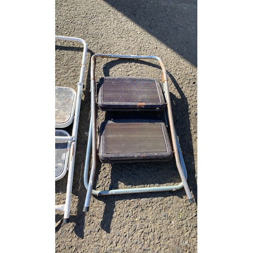 405 - Pair of vintage metal folding step stools with rubber treads. Sturdy construction.