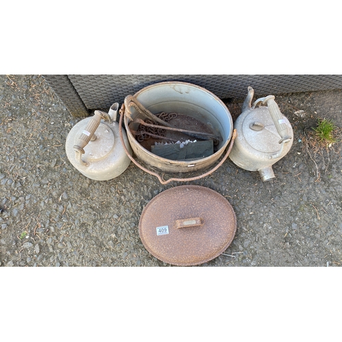 409 - Three vintage metal items: two aluminum kettles with handles and a large metal pot with lid and hand... 