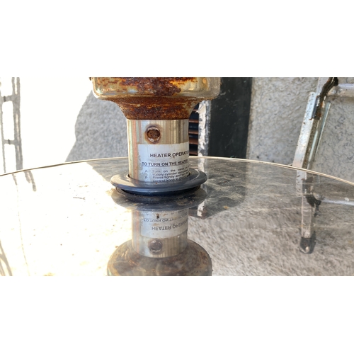 432 - Stainless steel patio heater with a rounded base and reflector.